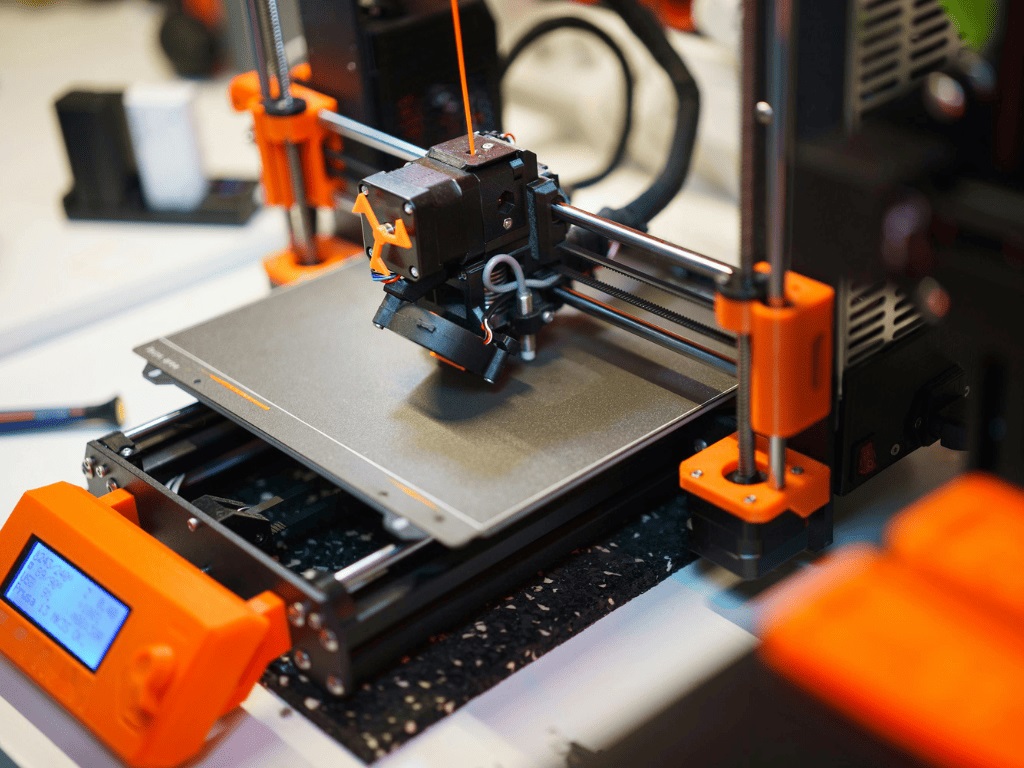 The picture shows a 3D printer.